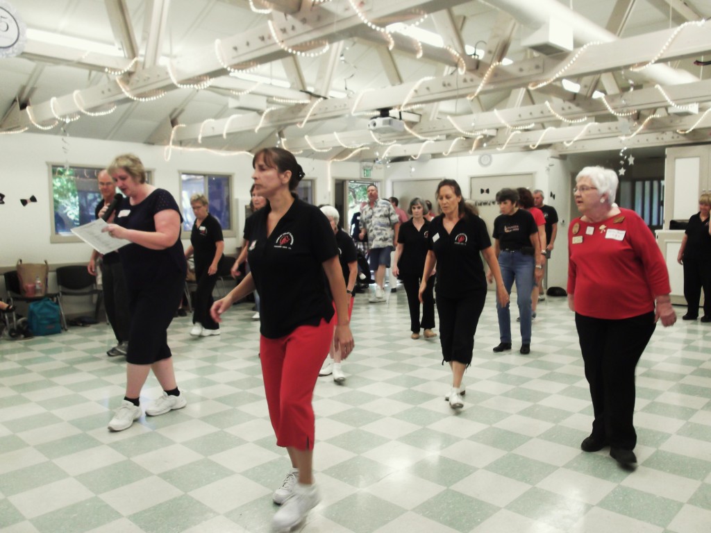 Julie, our charter instructor, and Evy, one of our current instructors at the front of the dance.